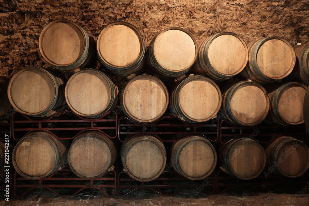 Wine cellar interior with large wooden barrels