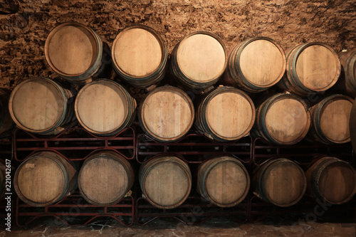 Wine cellar interior with large wooden barrels