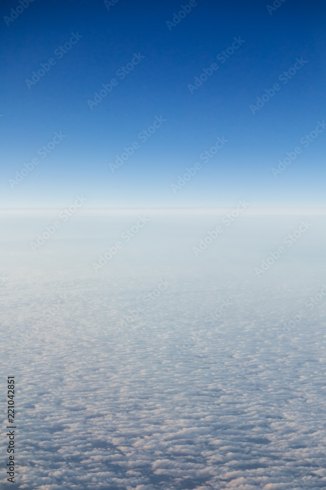 high sky above the clouds, blue atmosphere background