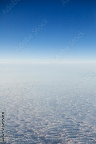 high sky above the clouds, blue atmosphere background