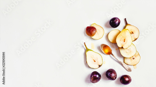 honey pears and plums. a spoonful of honey