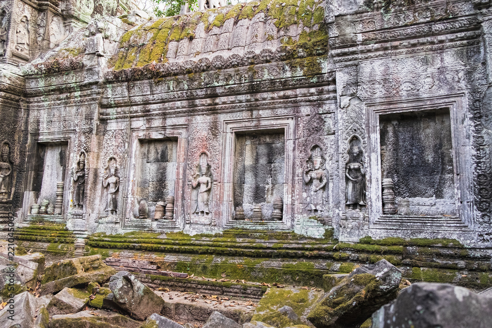 Ta Prohm Temple in Siem Reap, Cambodia. Ta Prohm with trees growing out of the ruins is in much the same condition in which it was found. Ancient Khmer architecture of Angkor Complex Ta Prohm Temple in Siem Reap, Cambodia. Ta Prohm with trees growing out of the ruins is in much the same condition in which it was found. Ancient Khmer architecture of Angkor Complex