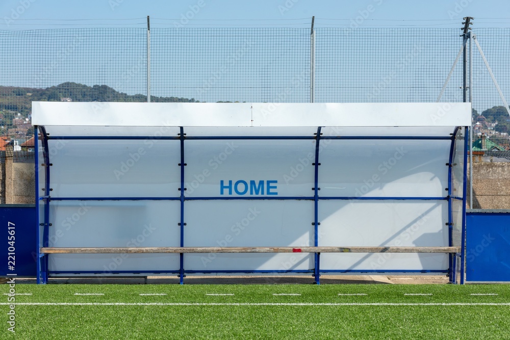 Fototapeta premium Home Team Dugout by Side of Artificial Grass Football Pitch