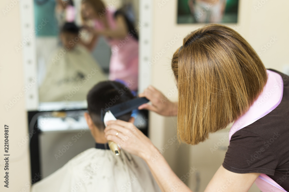Hairdresser, universal girl works with clients Hairdresser, universal girl works with clients