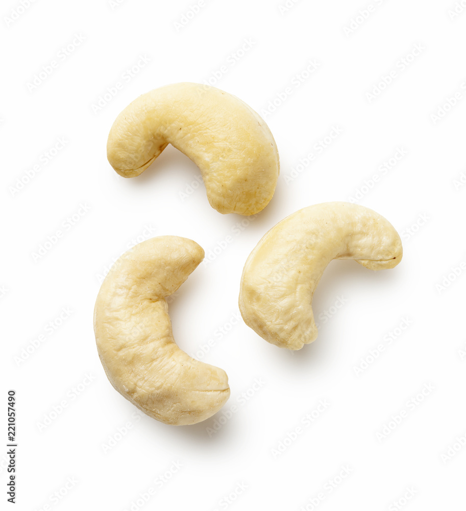 Roasted salted cashews isolated on a white background Roasted salted cashews isolated on a white background