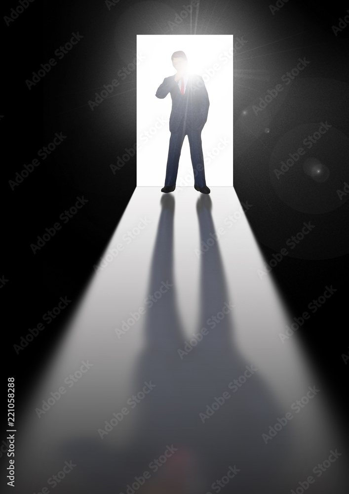 Obraz premium 扉を開けるビジネスマン