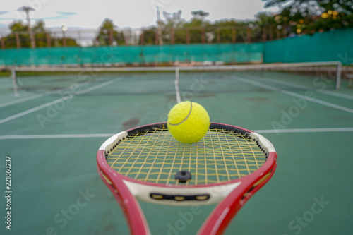 The beginning of a champion, Close up tennis ball on the courts background. © Danupol