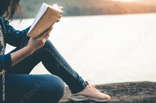 Women read books in quiet nature  concept read a books.
