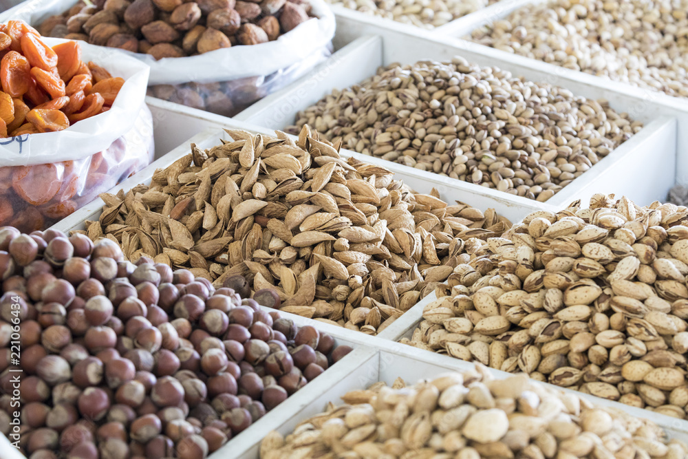 Dried fruits and nuts on local food market in Tashkent, Uzbekistan Dried fruits and nuts on local food market in Tashkent, Uzbekistan