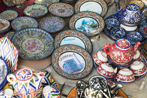Plates and pots on a street Chorsu bazaar in the city of Tashkent, Uzbekistan. © Curioso.Photography