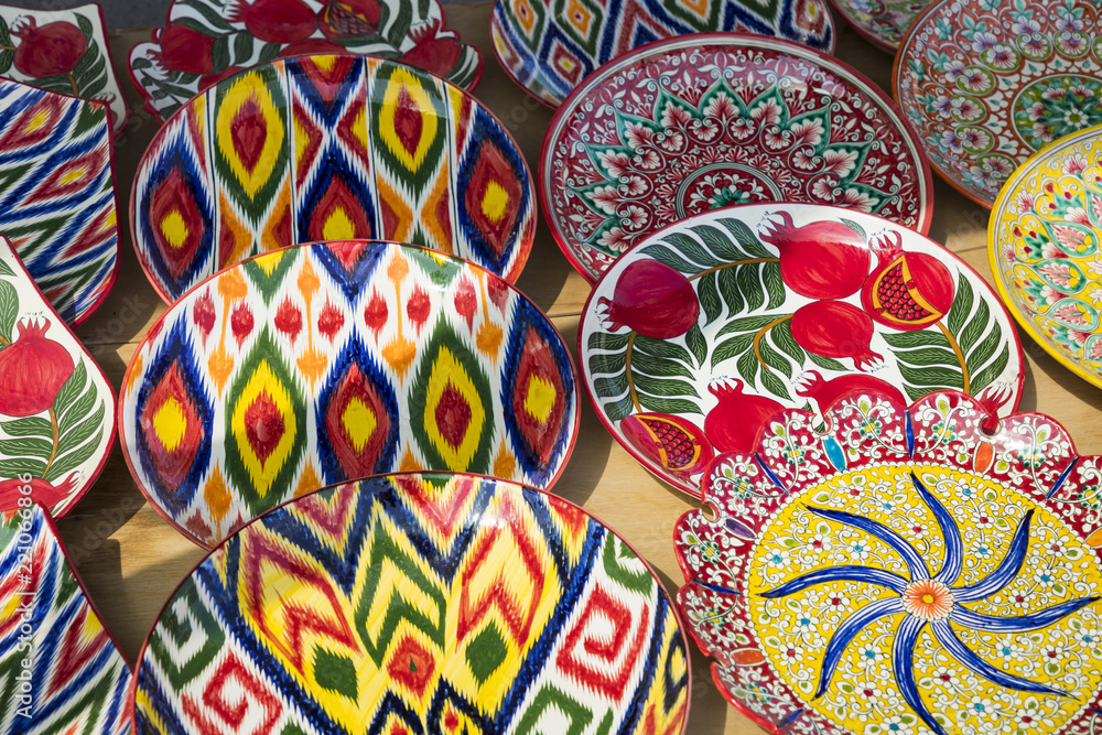 Fototapeta premium Plates and pots on a street Chorsu bazaar in the city of Tashkent, Uzbekistan.
