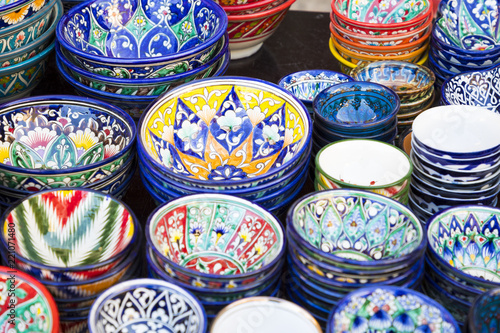 Plates and pots on a street market in the city of Bukhara  Uzbekistan.Traditional souvenir.
