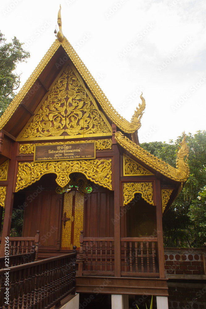 Fototapeta premium Thai teak wood chapel in temple