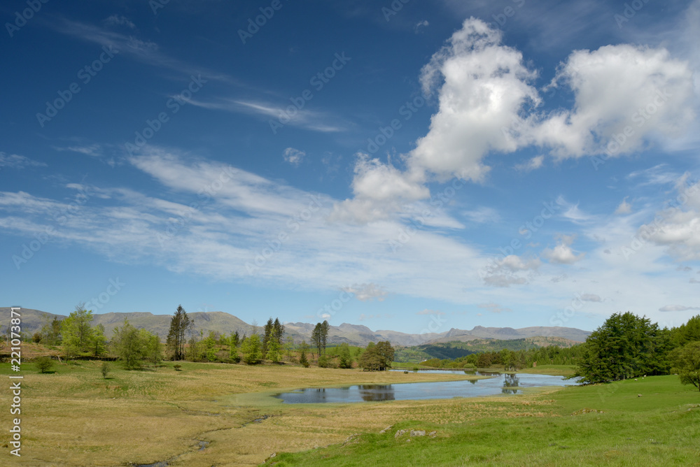 View of central fells over Wise Een Tarn on Claife Heights, Lake District View of central fells over Wise Een Tarn on Claife Heights, Lake District