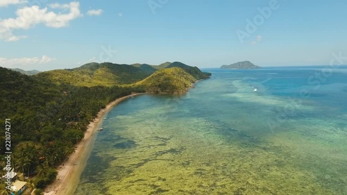 Aerial sand beach and palm trees on tropical island with turquoise sea. tropical seascape s Tropical landscape ocean, sky, sea Busuanga, Palawan, Philippines photo