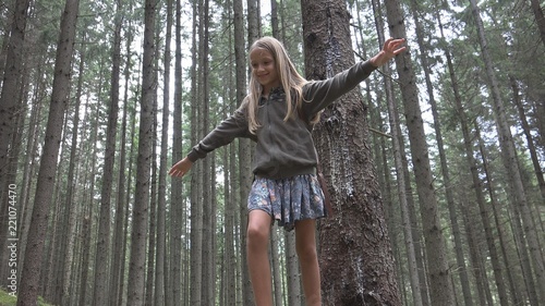 Child in Forest Walking on Log, Girl Camping, Kid In Mountains Outdoor in Wood