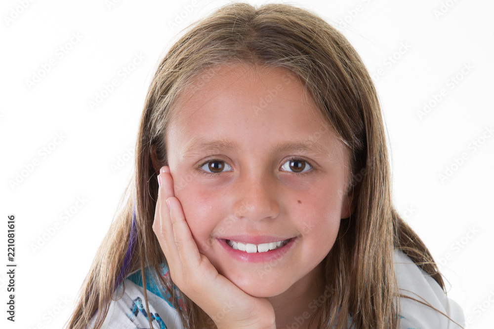 Cute portrait of a happy smiling child girl over bright white background Cute portrait of a happy smiling child girl over bright white background