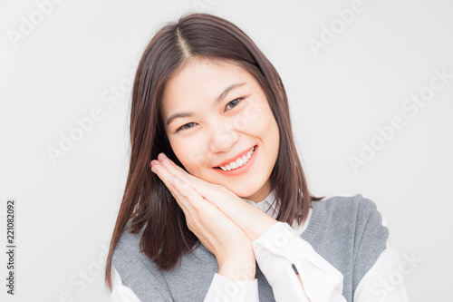 Portrait of attractive young asian women relaxing and smiling © themorningglory