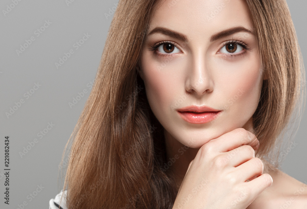 Beautiful brunette woman with healthy skin and hair pure skin model face Beautiful brunette woman with healthy skin and hair pure skin model face