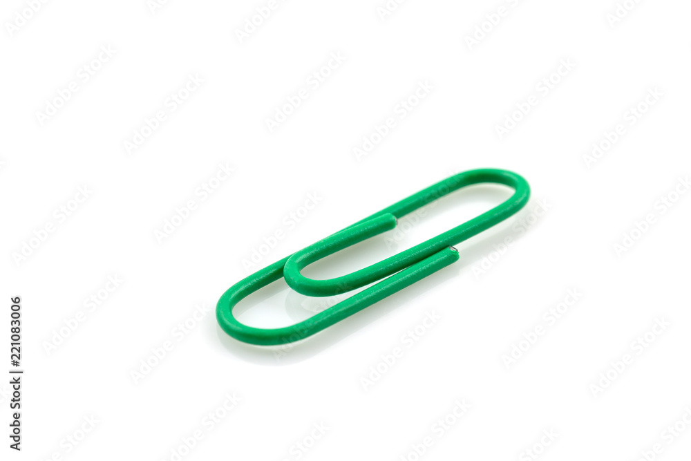 Single Green paper clip isolated on white Single Green paper clip isolated on white