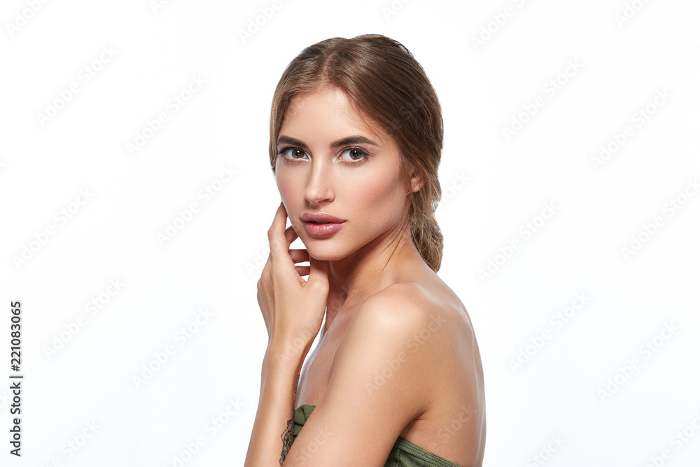 Beautiful face woman with healthy clean skin and natural makeup isolated on white Beautiful face woman with healthy clean skin and natural makeup isolated on white