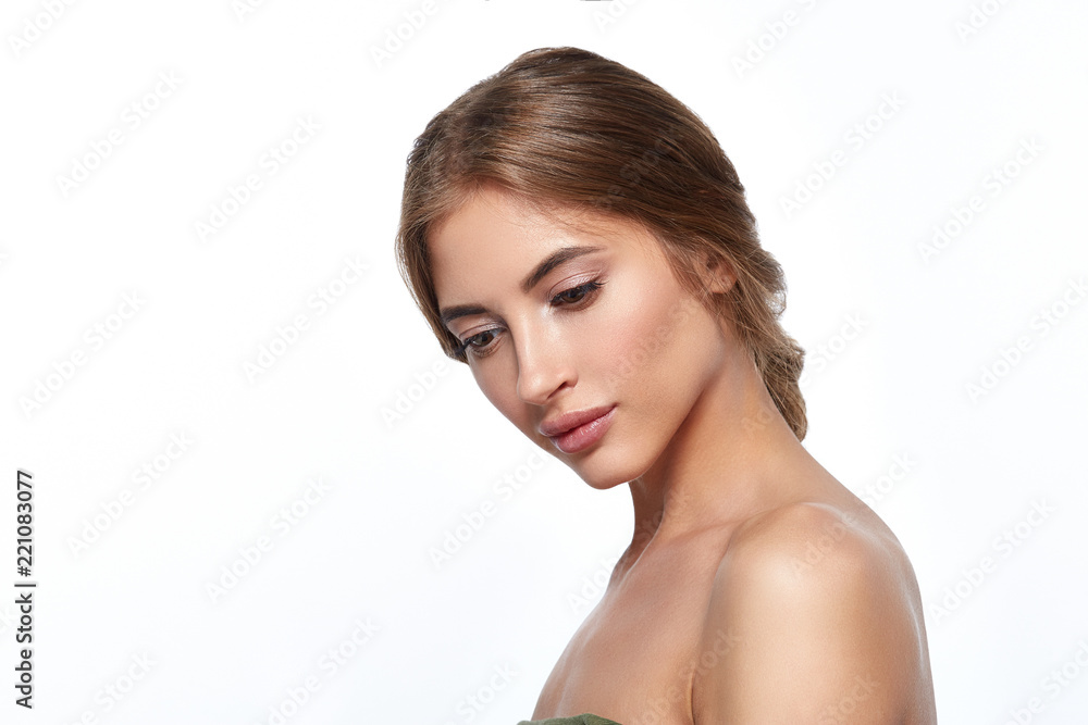 Beautiful face woman with healthy clean skin and natural makeup isolated on white Beautiful face woman with healthy clean skin and natural makeup isolated on white