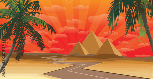 road in the desert and pyramid