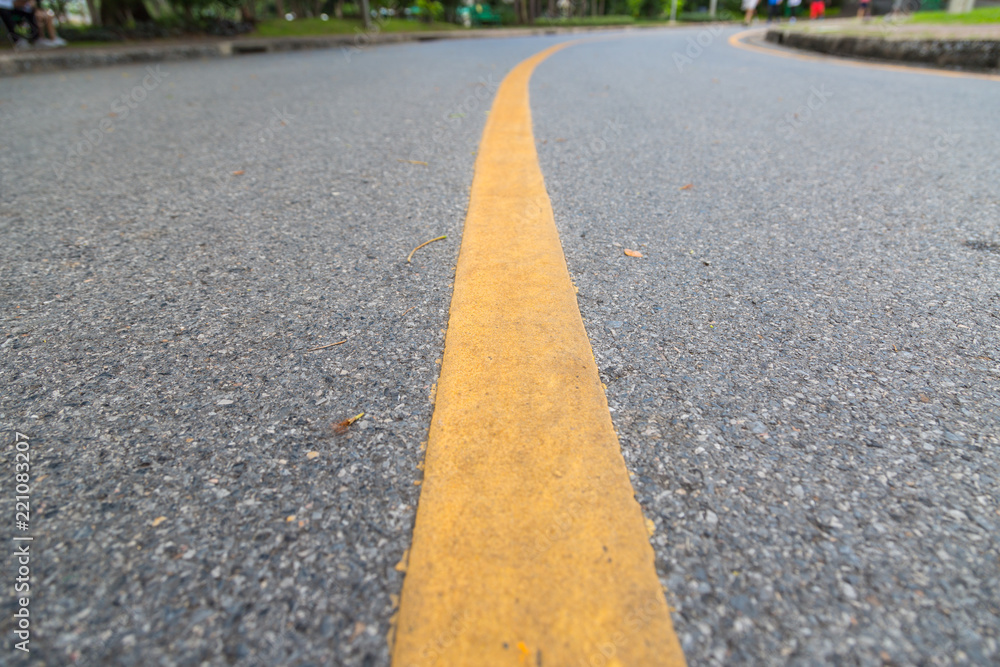 Close up of yellow line  on the public park
