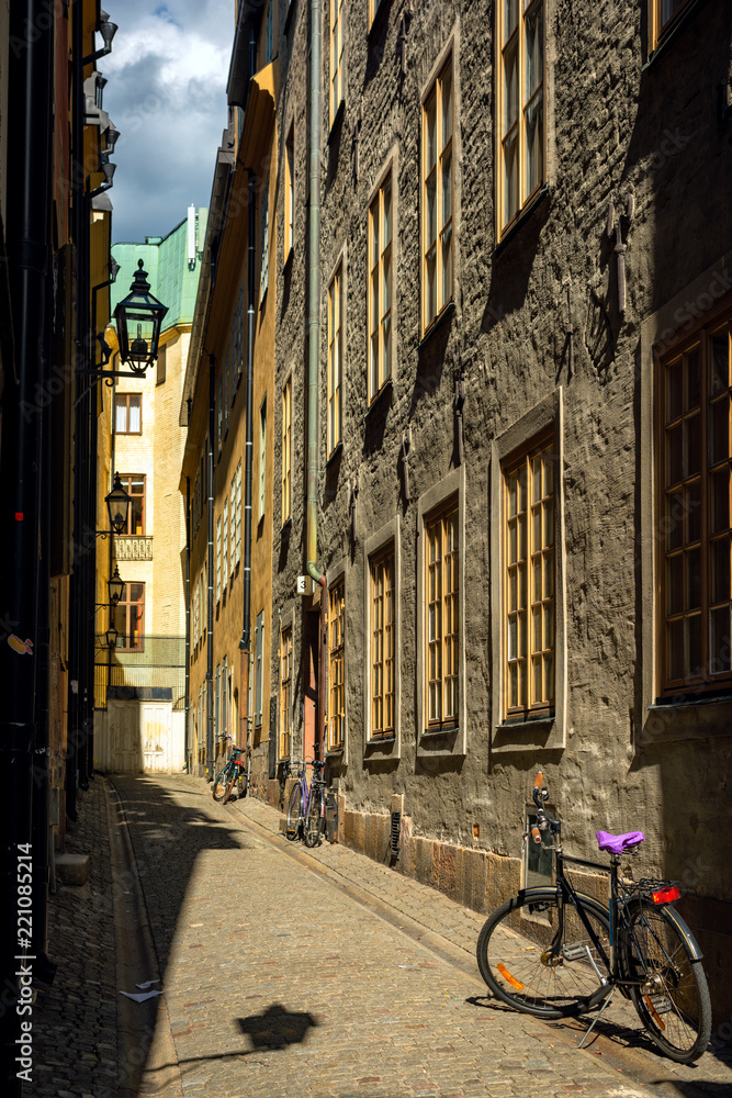 Fototapeta Narrow street of Stockholm old town.