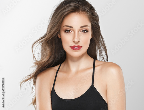 Beautiful woman face with healthy skin and beauty eyes lips brunette