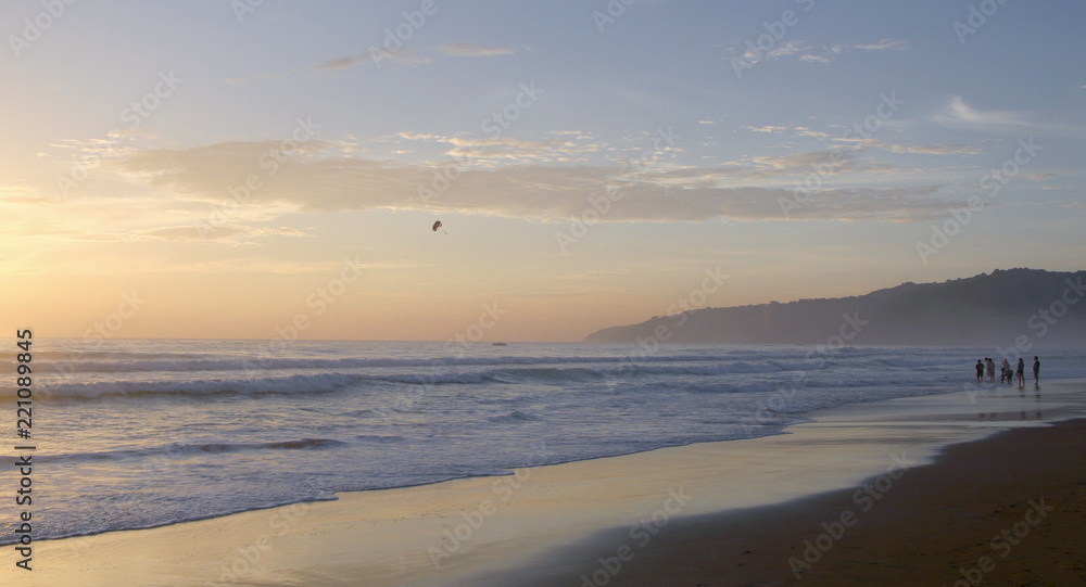 Beautiful sunset on Karon beach. The surf pounds the shore. Phuket, Thailand Beautiful sunset on Karon beach. The surf pounds the shore. Phuket, Thailand
