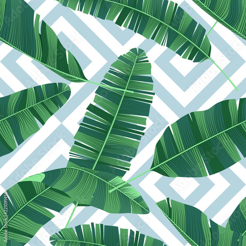 Seamless pattern tropical banana leaves on geometrical ornament