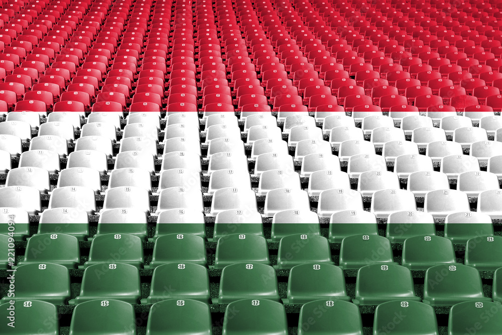 Fototapeta premium Siedziska stadionowe z flagą Węgier. Koncepcja konkurencji sportowych.