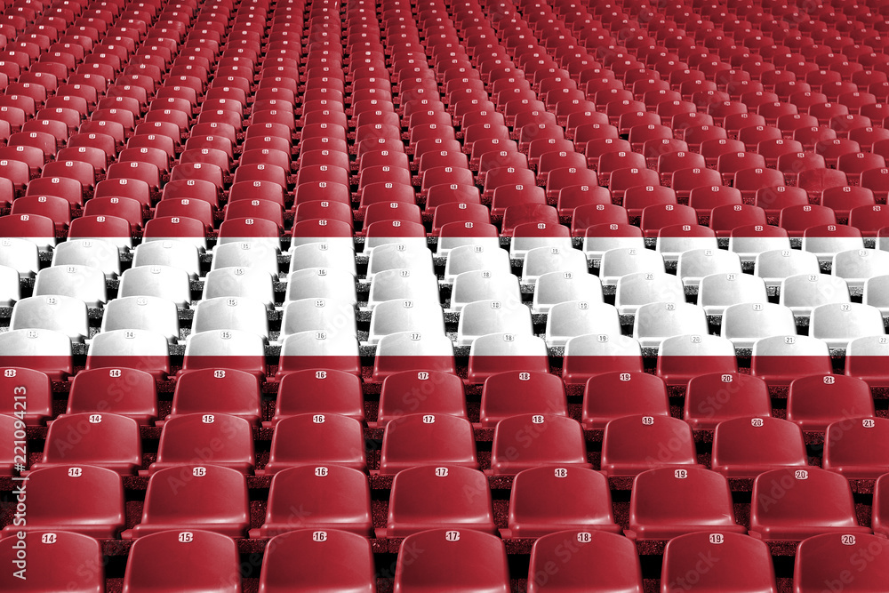 Fototapeta premium Miejsca na stadionie flagowym Łotwy. Koncepcja konkurencji sportowych.
