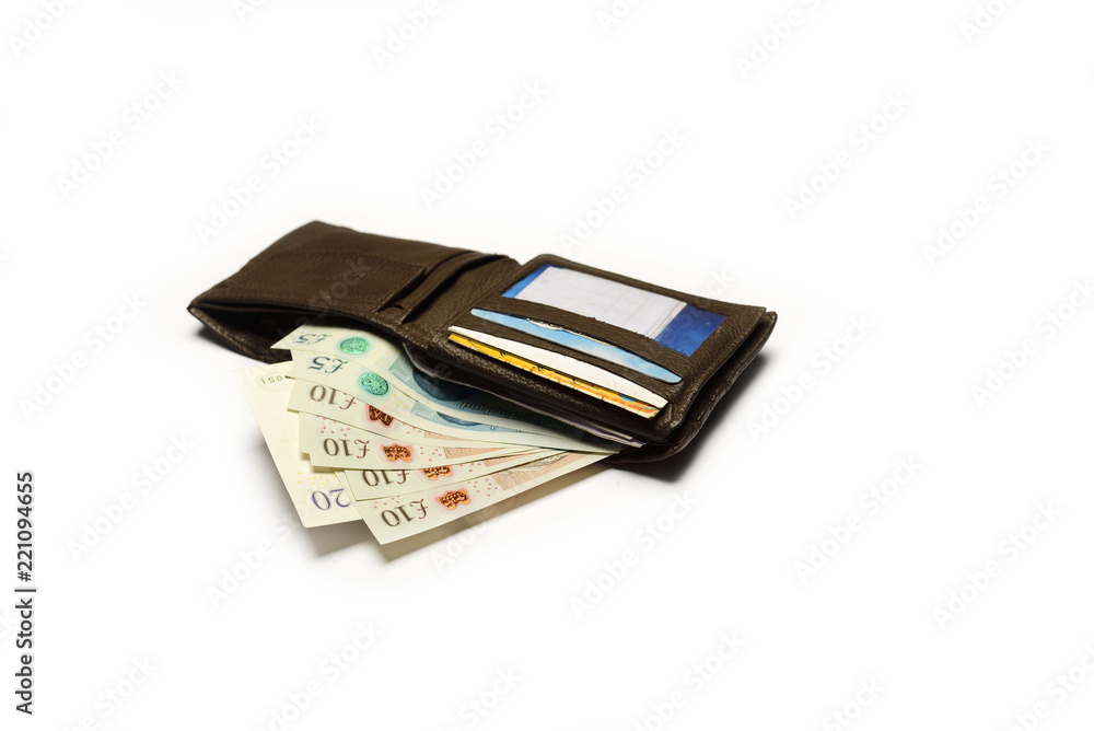 Pound sterling in wallet on isolated white background Pound sterling in wallet on isolated white background