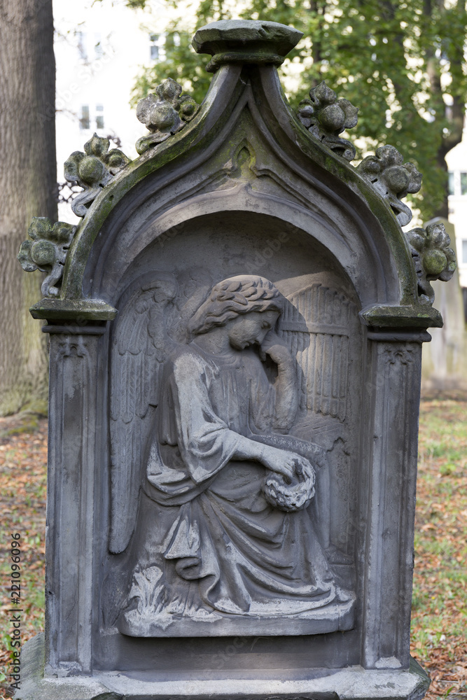 Fototapeta premium Historic Statue on the mystery old Prague Cemetery, Czech Republic