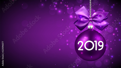 Purple 2019 New Year background with Christmas ball.