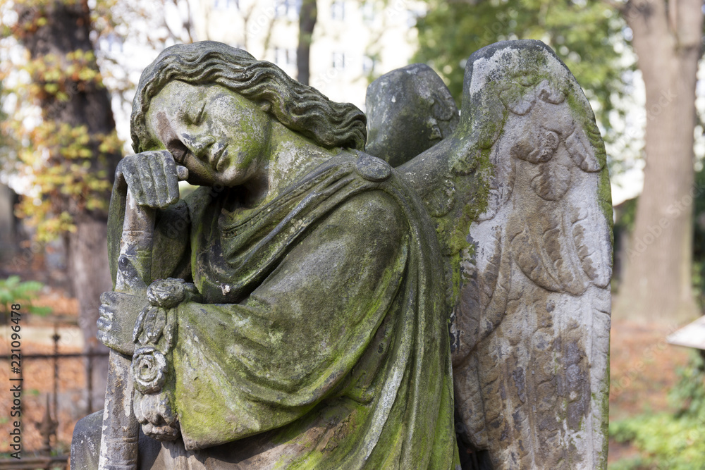 Historic Statue on the mystery old Prague Cemetery, Czech Republic