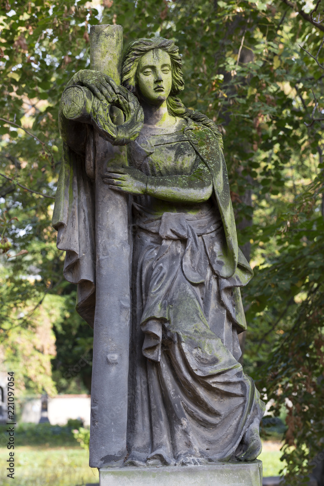 Historic Statue on the mystery old Prague Cemetery, Czech Republic