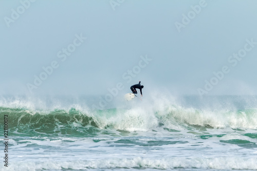Wave jumping, Fistral beach, Newquay, Cornwall