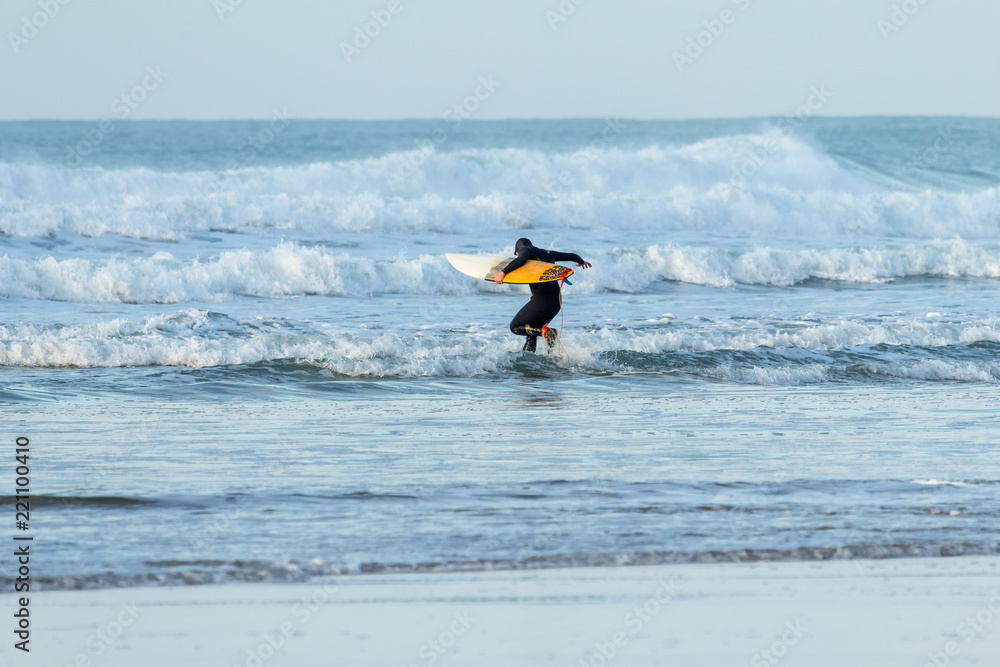 Running in Surf, Fistral Beach, Newquay