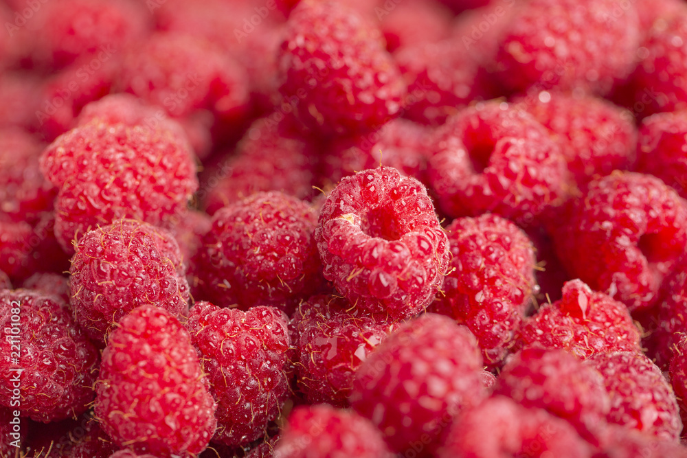 Raspberry fresh and sweet on wooden background close up Raspberry fresh and sweet on wooden background close up
