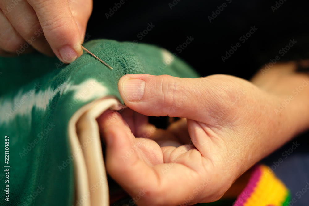 hand sewing tie dye fabric handbag
