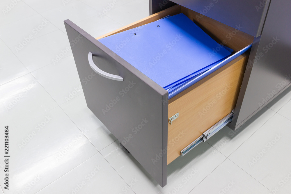 blue file folder documents In a file cabinet retention of contracts, Documentation Concepts blue file folder documents In a file cabinet retention of contracts, Documentation Concepts