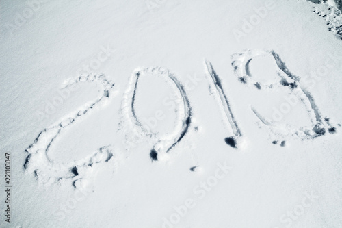 Inscription 2019 on the snow, simbol of new year 2019