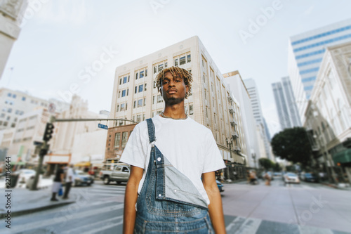 Fotobehang Young guy with dreadlocks in downtown LA