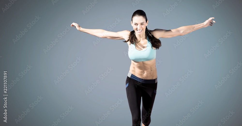 Obraz premium Athletic exercise woman with blank blue background