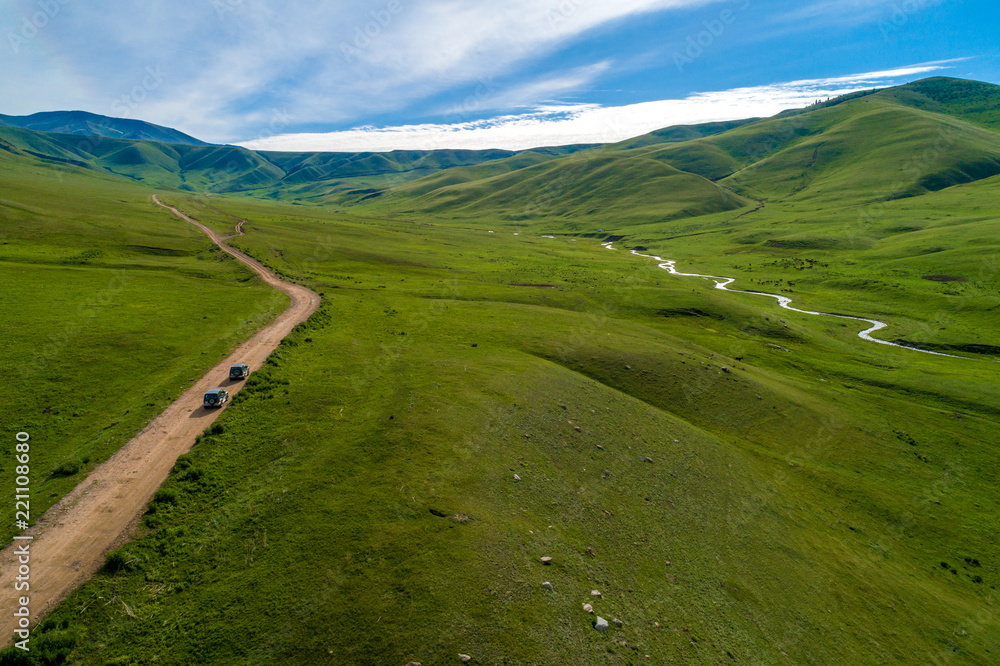 Amazing aerial view at road in the mountain.Road through hills