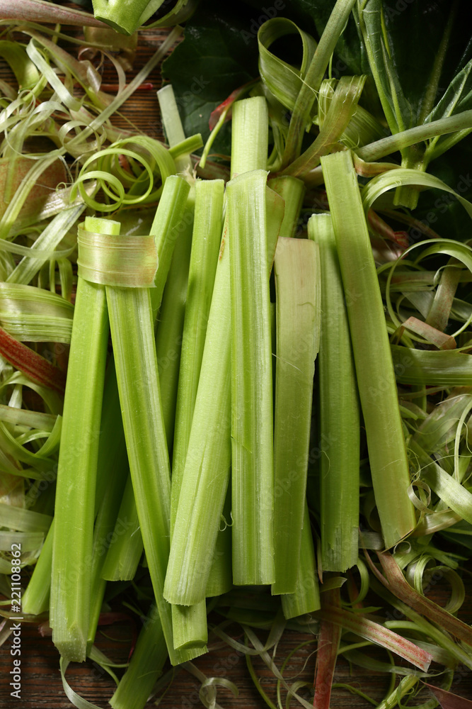 Fototapeta premium Fresh rhubarb sticks top view