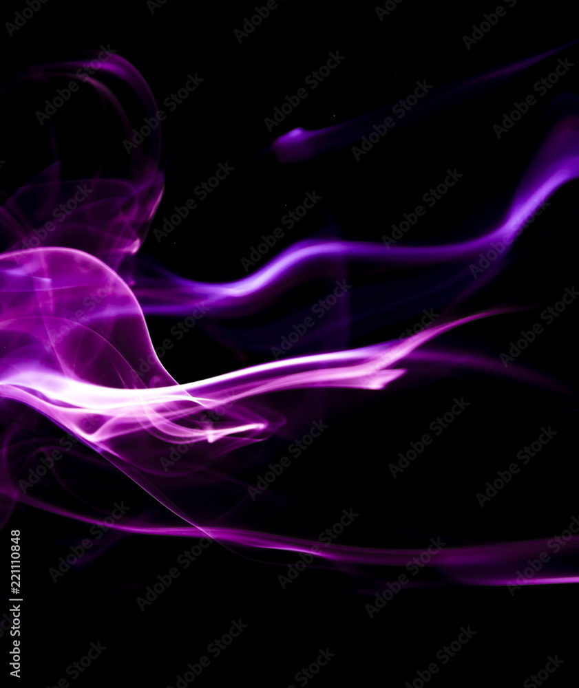 Fototapeta premium Purple smoke on black background
